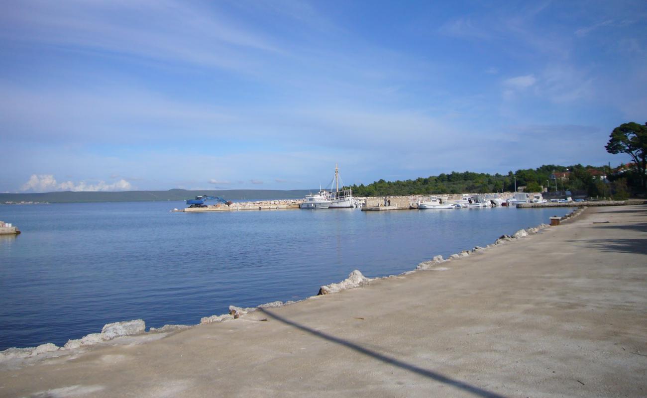 Photo of Zdrelac beach with concrete cover surface