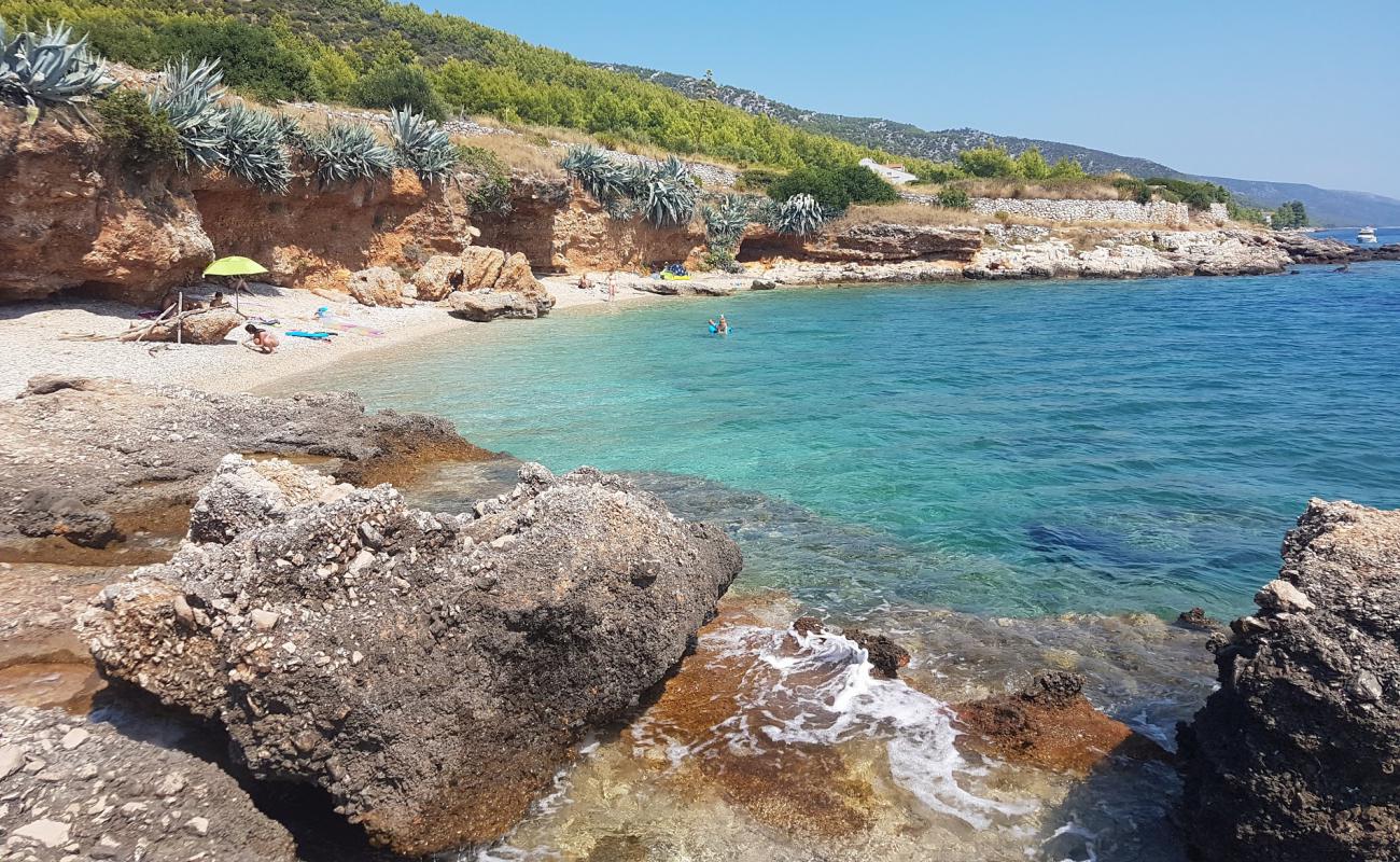 Photo of Gromin Dolac beach with light fine pebble surface