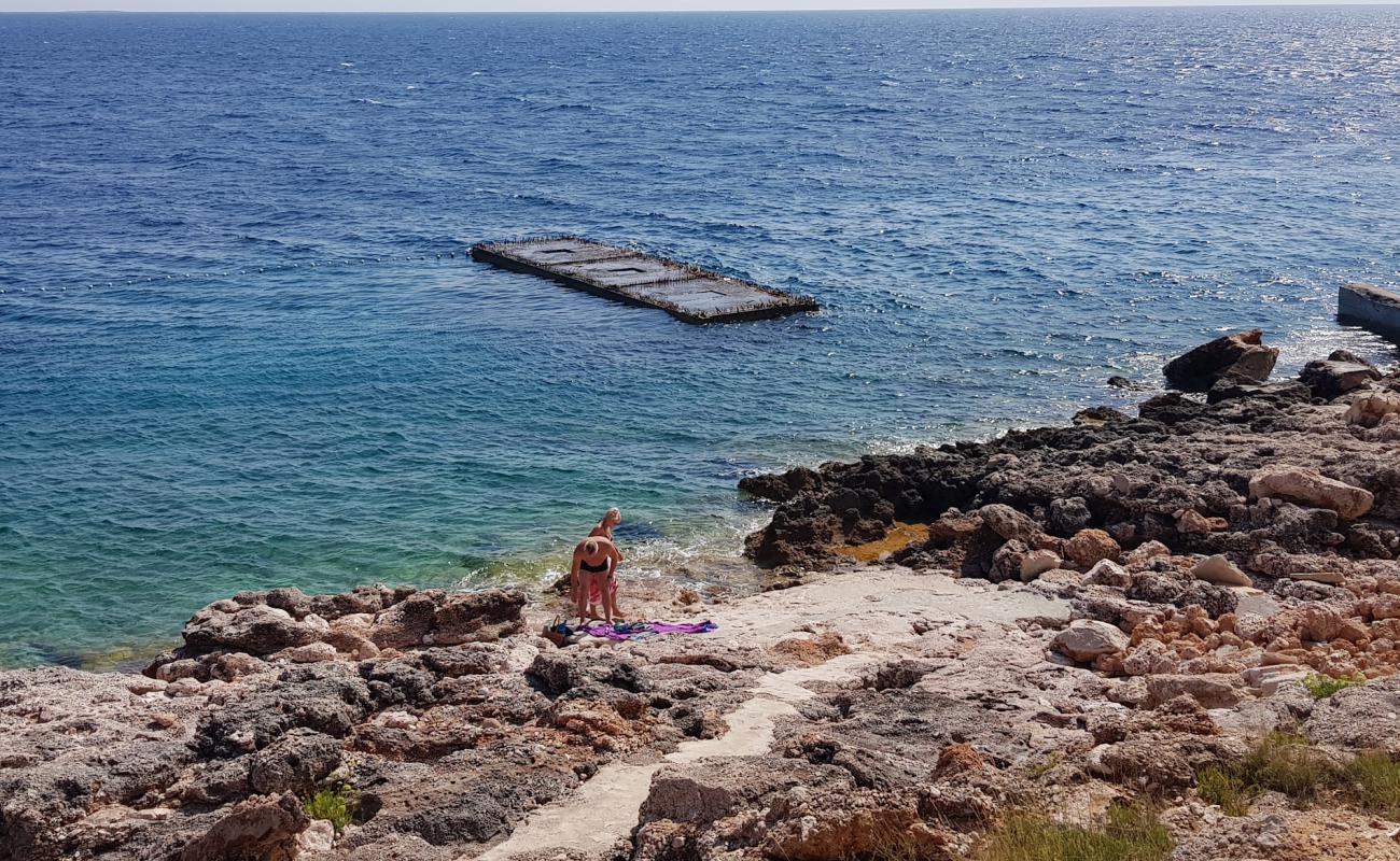 Photo of Sveta Nedjelja beach with rocks cover surface