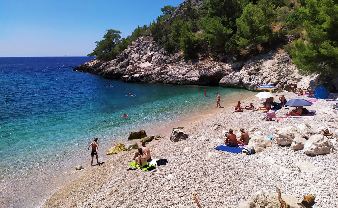 Photo of Lucisca bay beach with light fine pebble surface