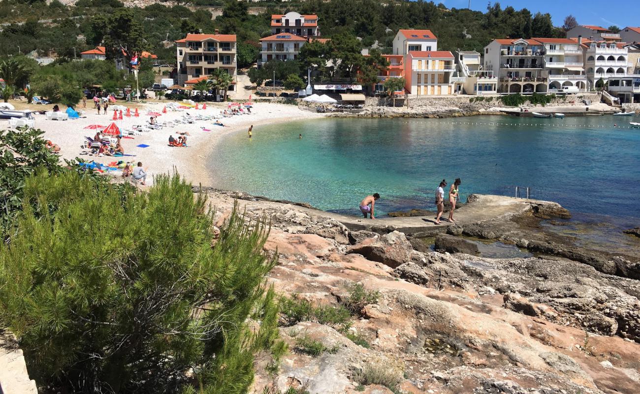 Photo of Milna beach with light fine pebble surface