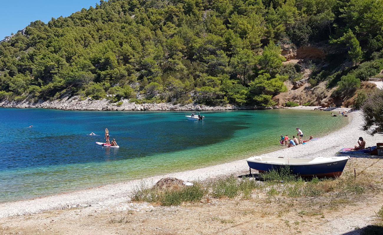 Photo of Stiniva beach with white pebble surface