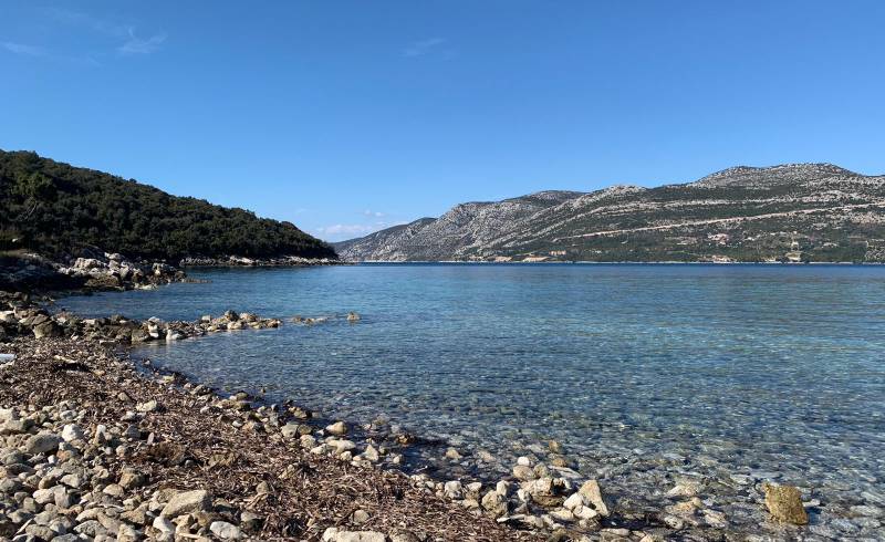 Photo of Korcula beach with light pebble surface