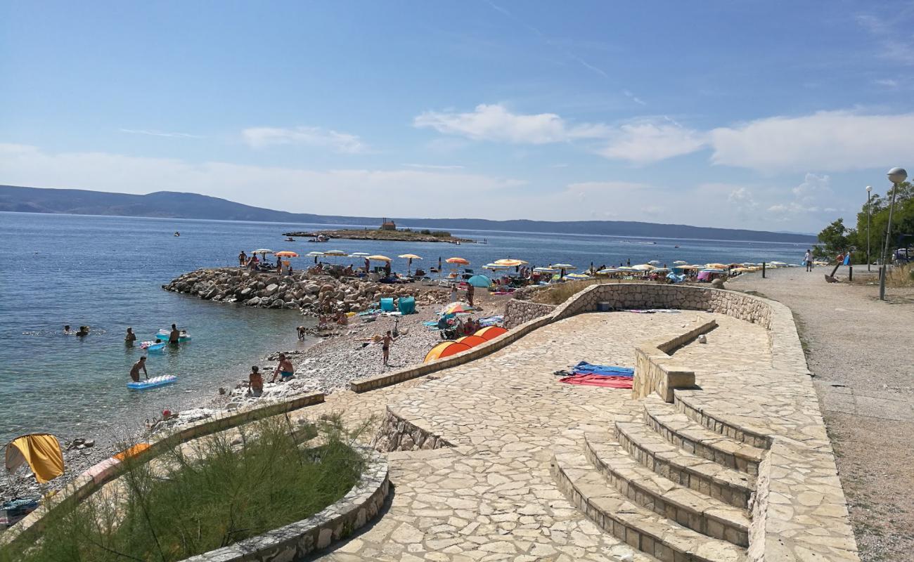 Photo of Lopar Beach with rocks cover surface