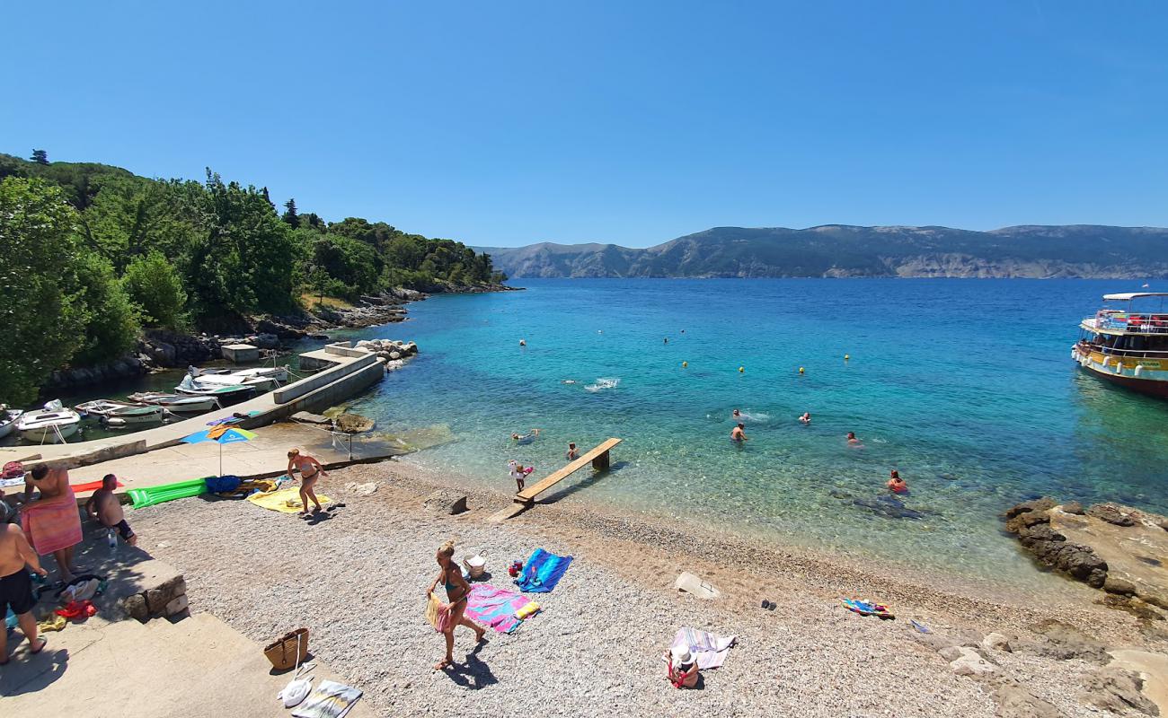 Photo of Glavotok Port Beach with gray fine pebble surface