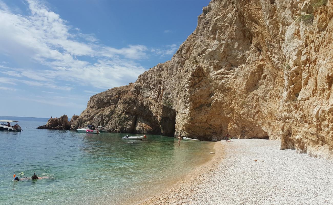 Photo of Golden Bay Beach with light fine pebble surface