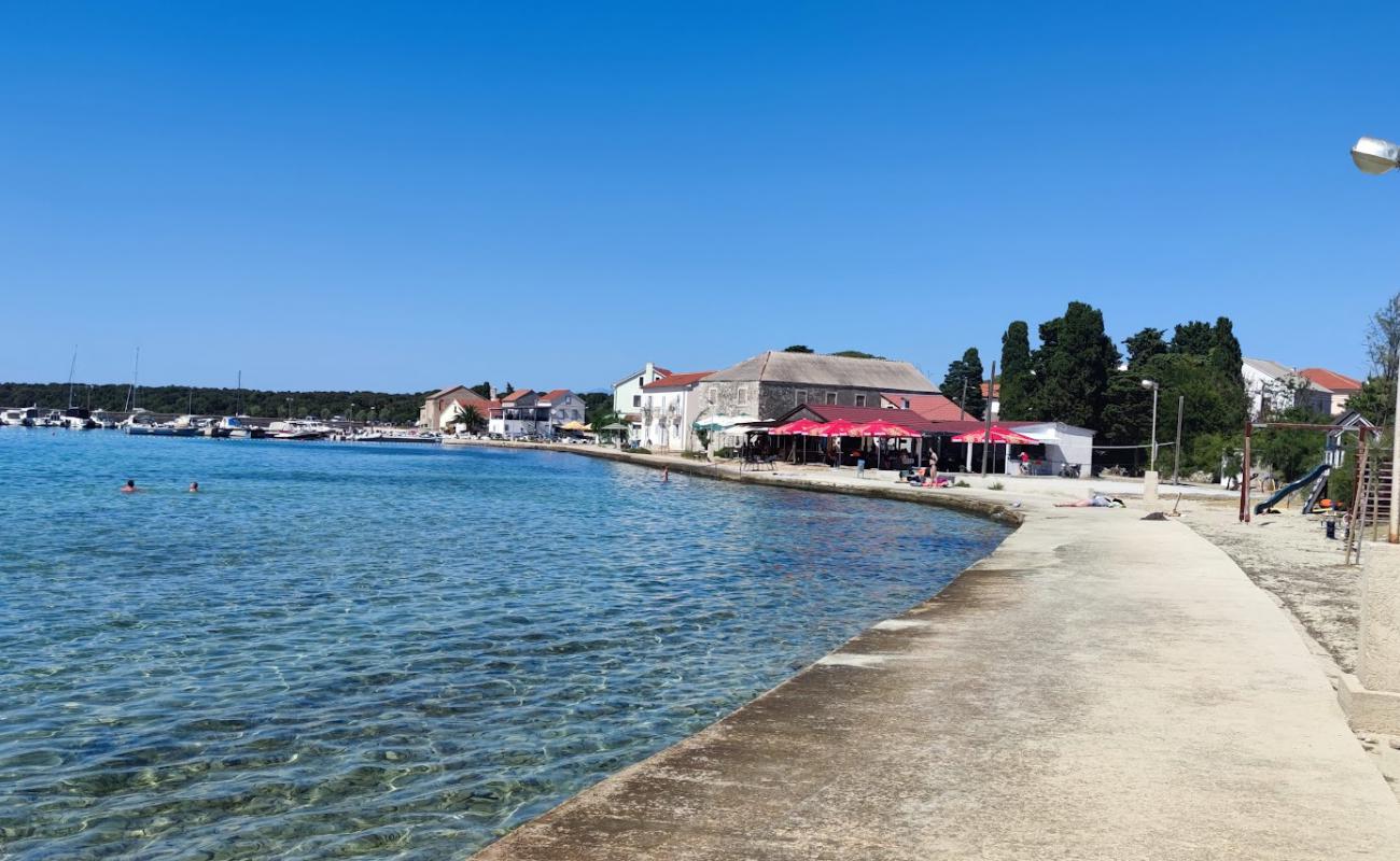 Photo of Olib Beach with rocks cover surface