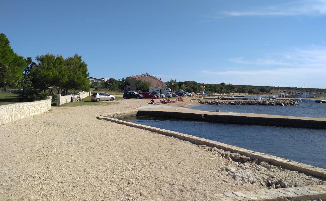 Photo of Port of Proboj Beach with gray sand &  rocks surface