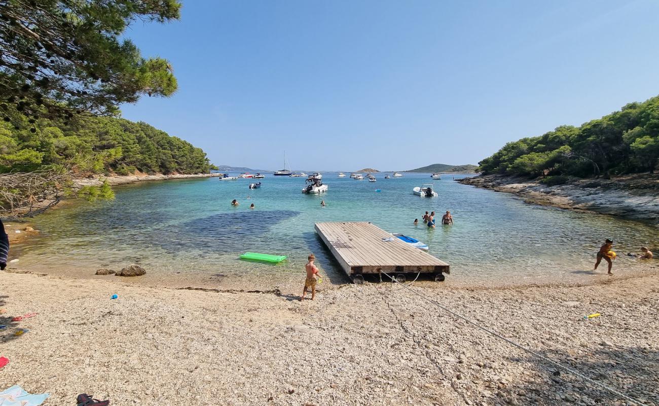 Photo of Kranje Beach, Vrgada with rocks cover surface