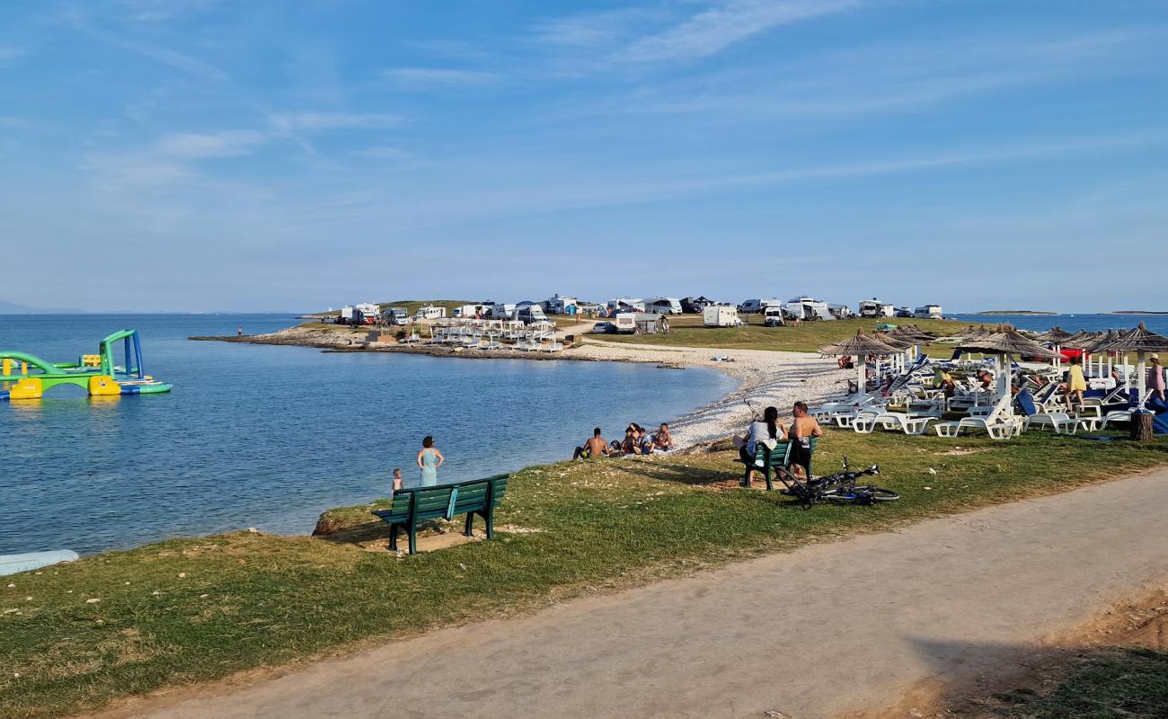 Photo of Premantura Beach with rocks cover surface