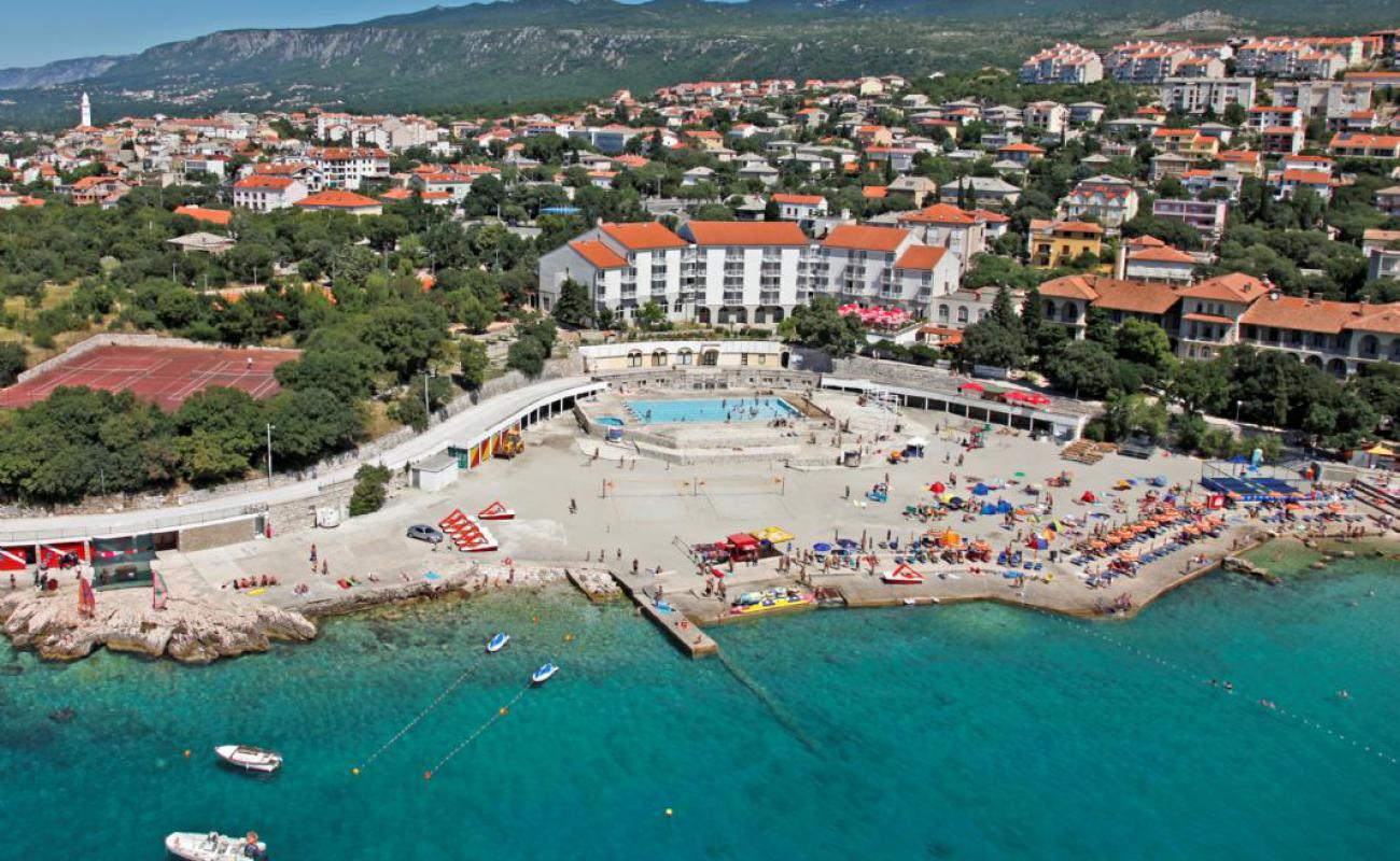 Photo of Swimming pool Novi Vinodolski with concrete cover surface