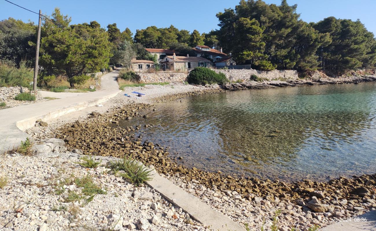 Photo of Dolinje Beach with rocks cover surface