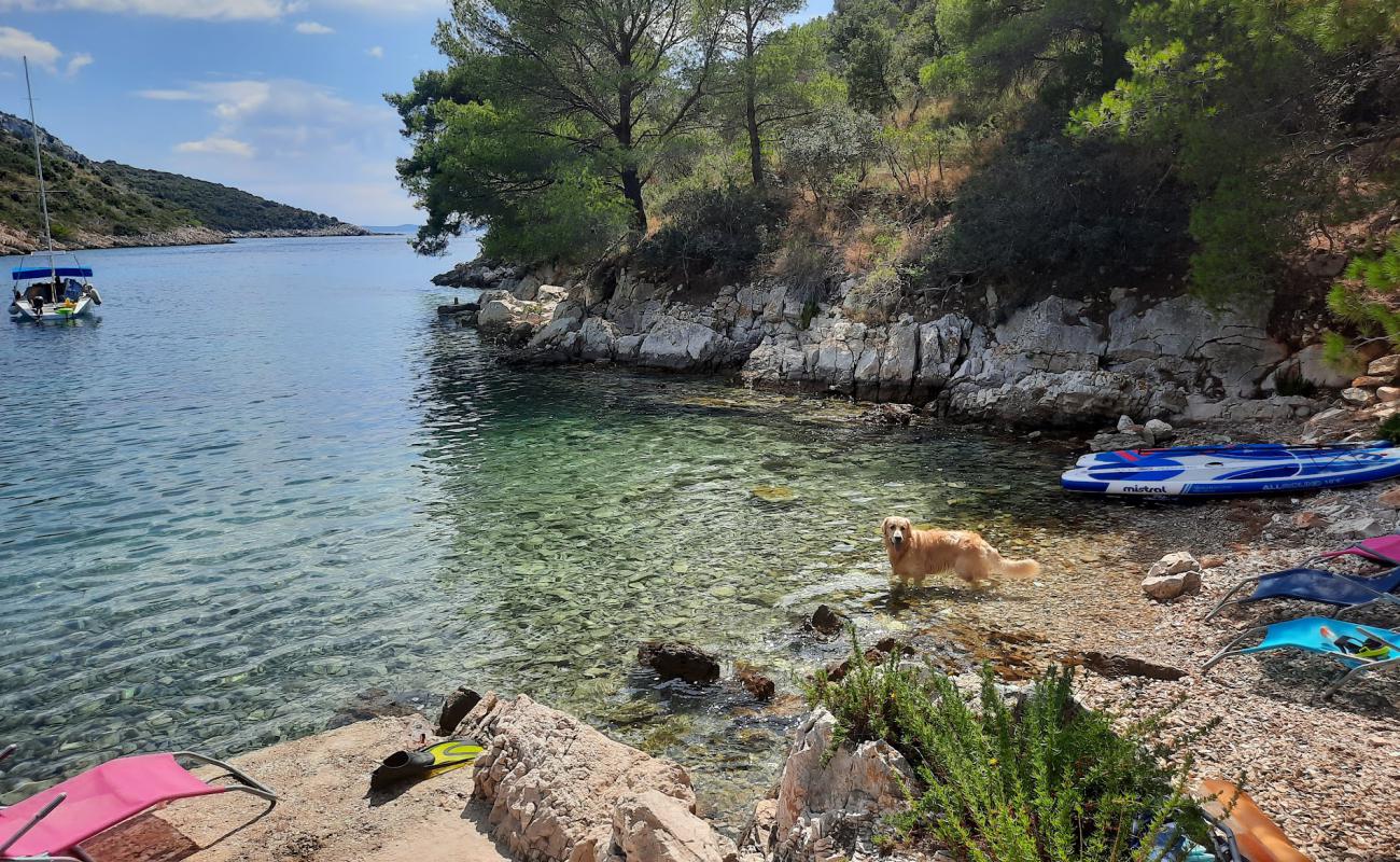 Photo of Beach Travna with rocks cover surface