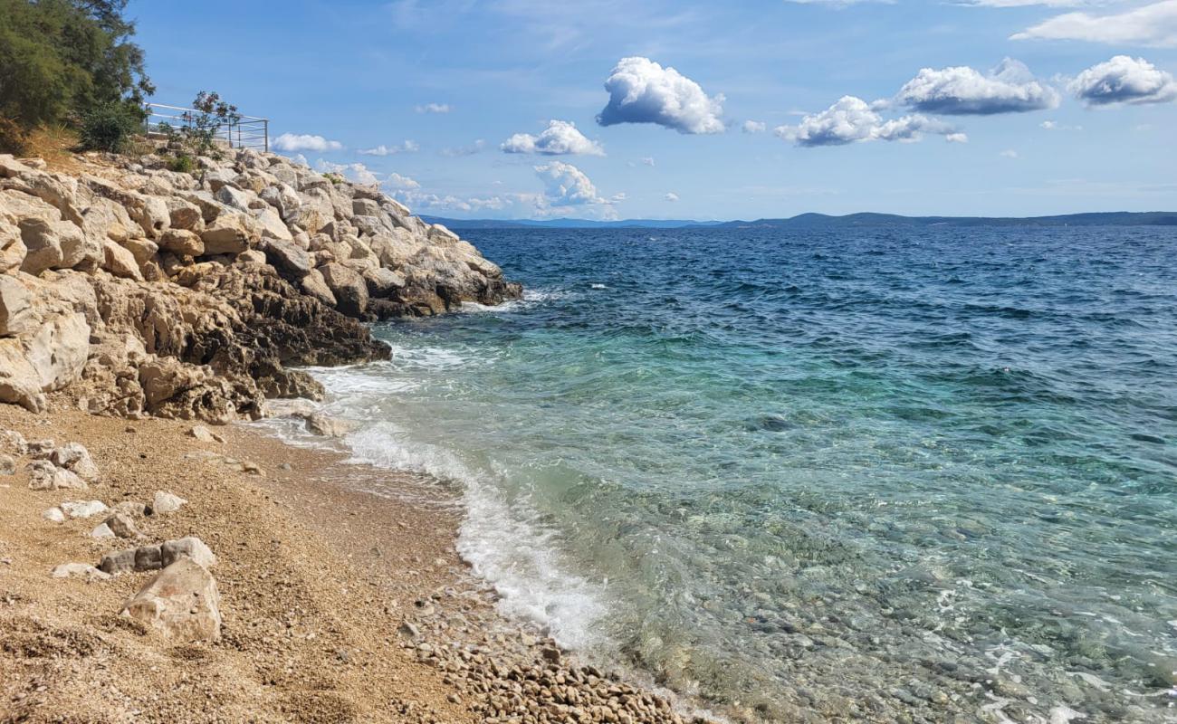 Photo of Orlice beach with rocks cover surface