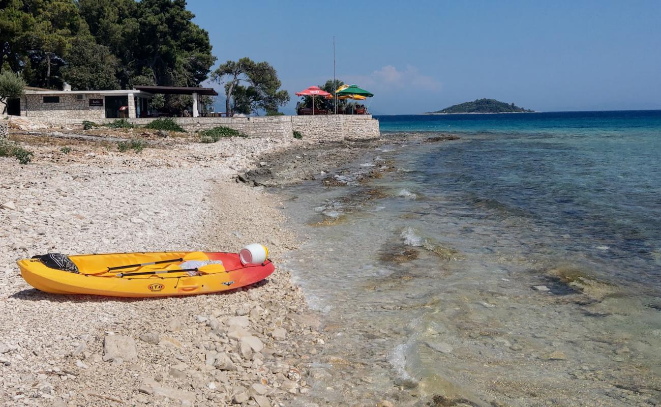 Photo of Badija Beach with rocks cover surface