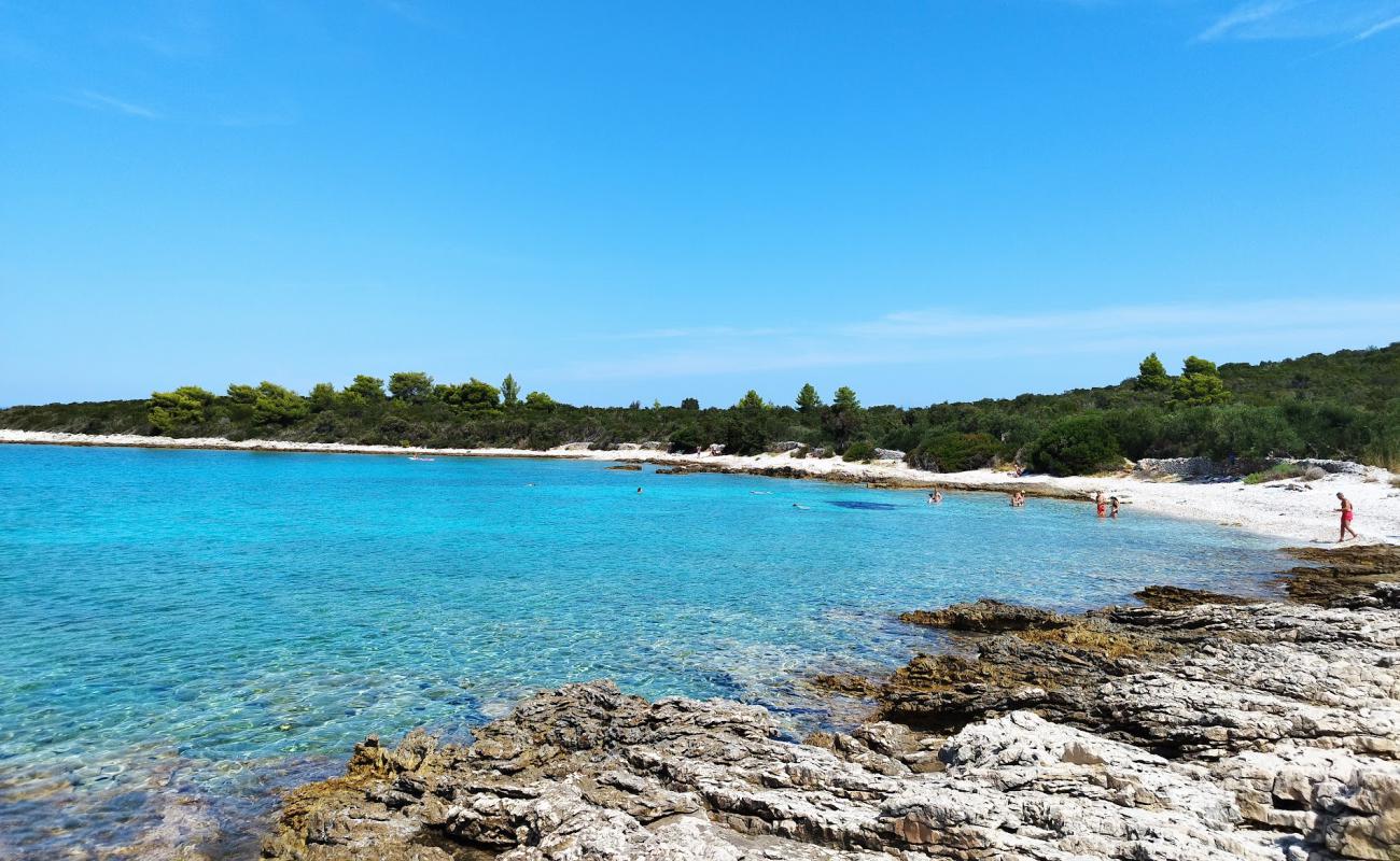 Photo of Beach pri Loviste with rocks cover surface