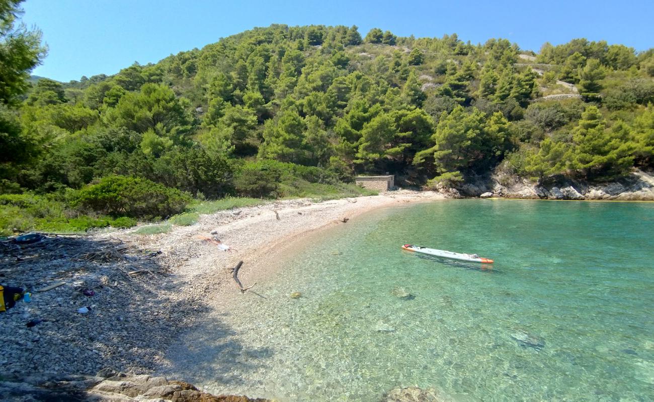 Photo of Slatina Bay with rocks cover surface