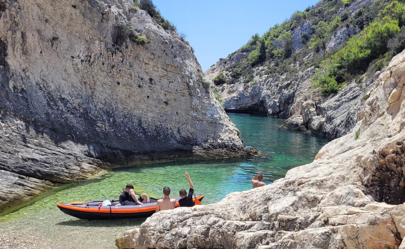 Photo of Mala Pritiscina Beach with light pebble surface