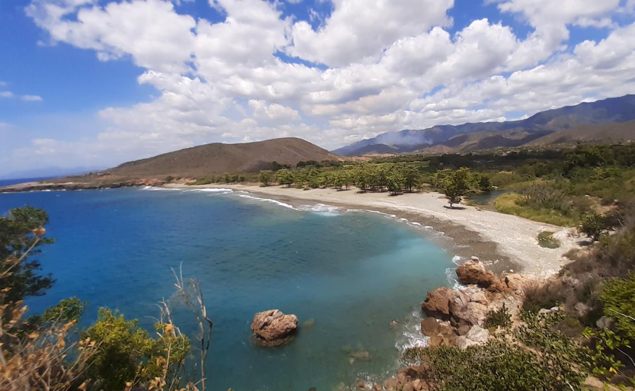 Photo of Playa Damajayabo with gray sand &  pebble surface