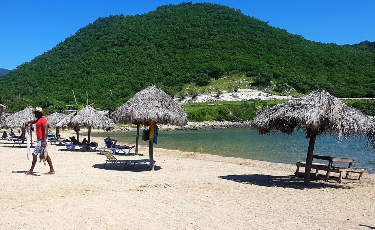 Photo of Playa Bueycabon with light sand &  pebble surface