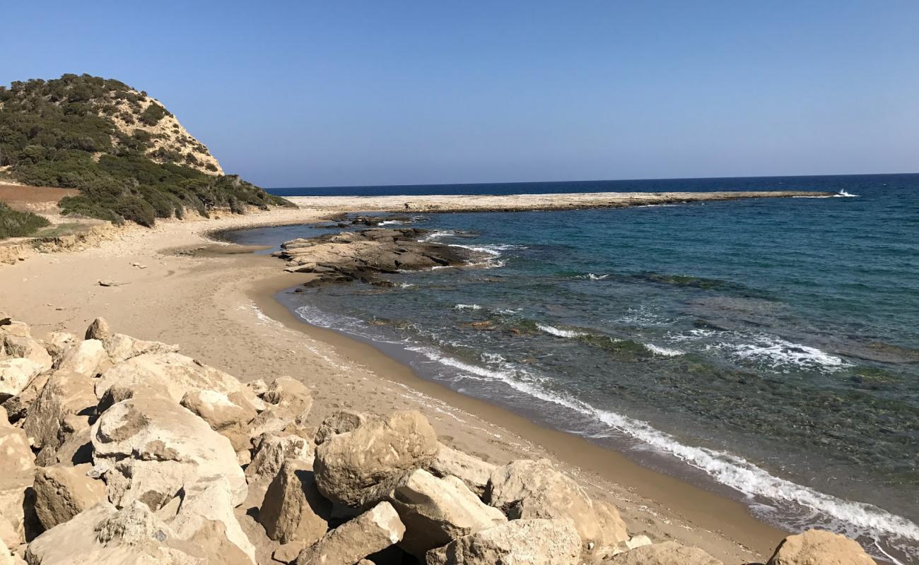 Photo of Nikos beach with bright sand surface