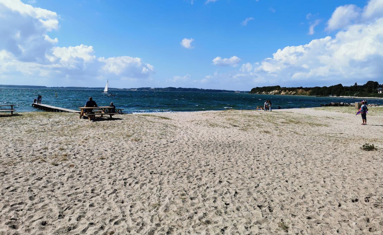 Photo of Fluepapiret Beach with bright sand surface