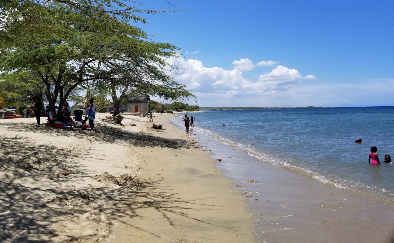 Photo of Playa Los Coquitos with bright sand surface