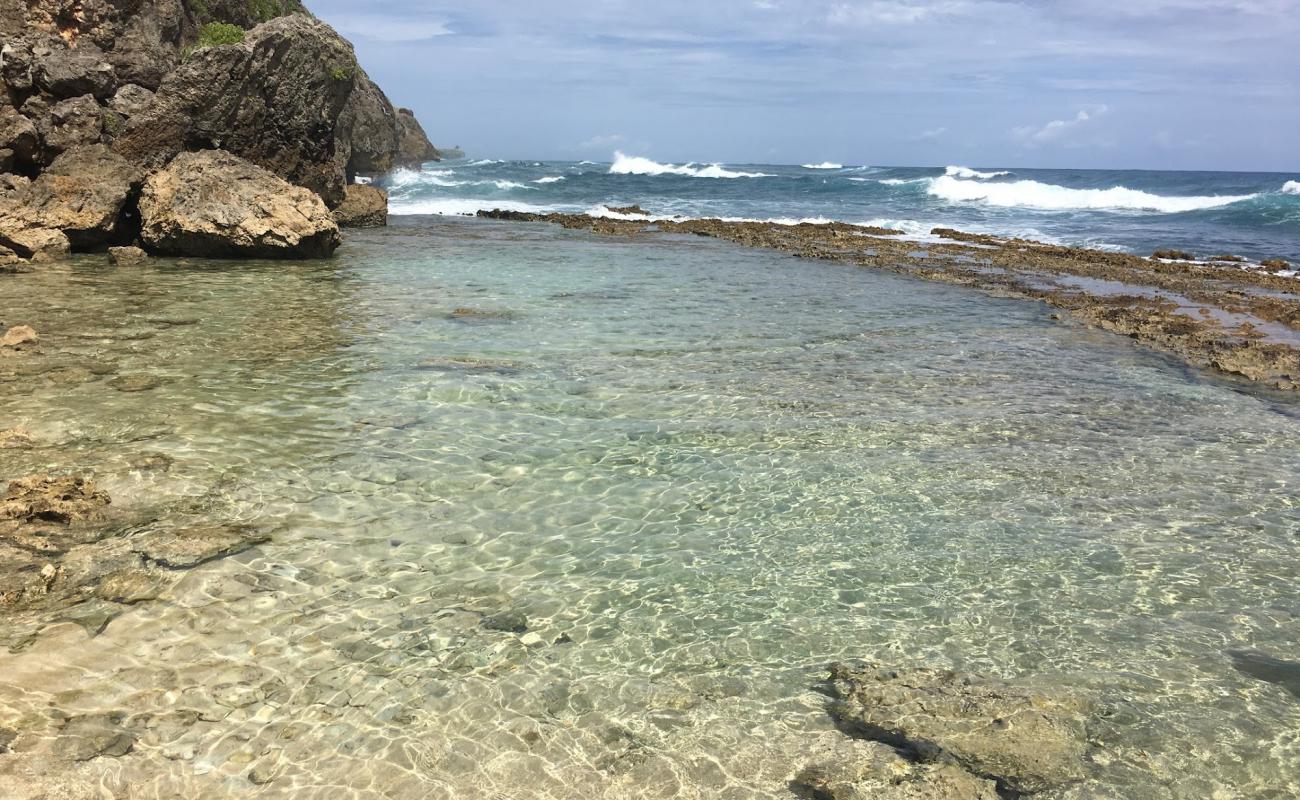 Photo of Playa Caleton Pequena with bright sand & rocks surface