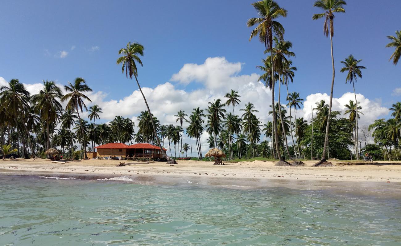 Photo of Playa Los Cocos with bright sand surface