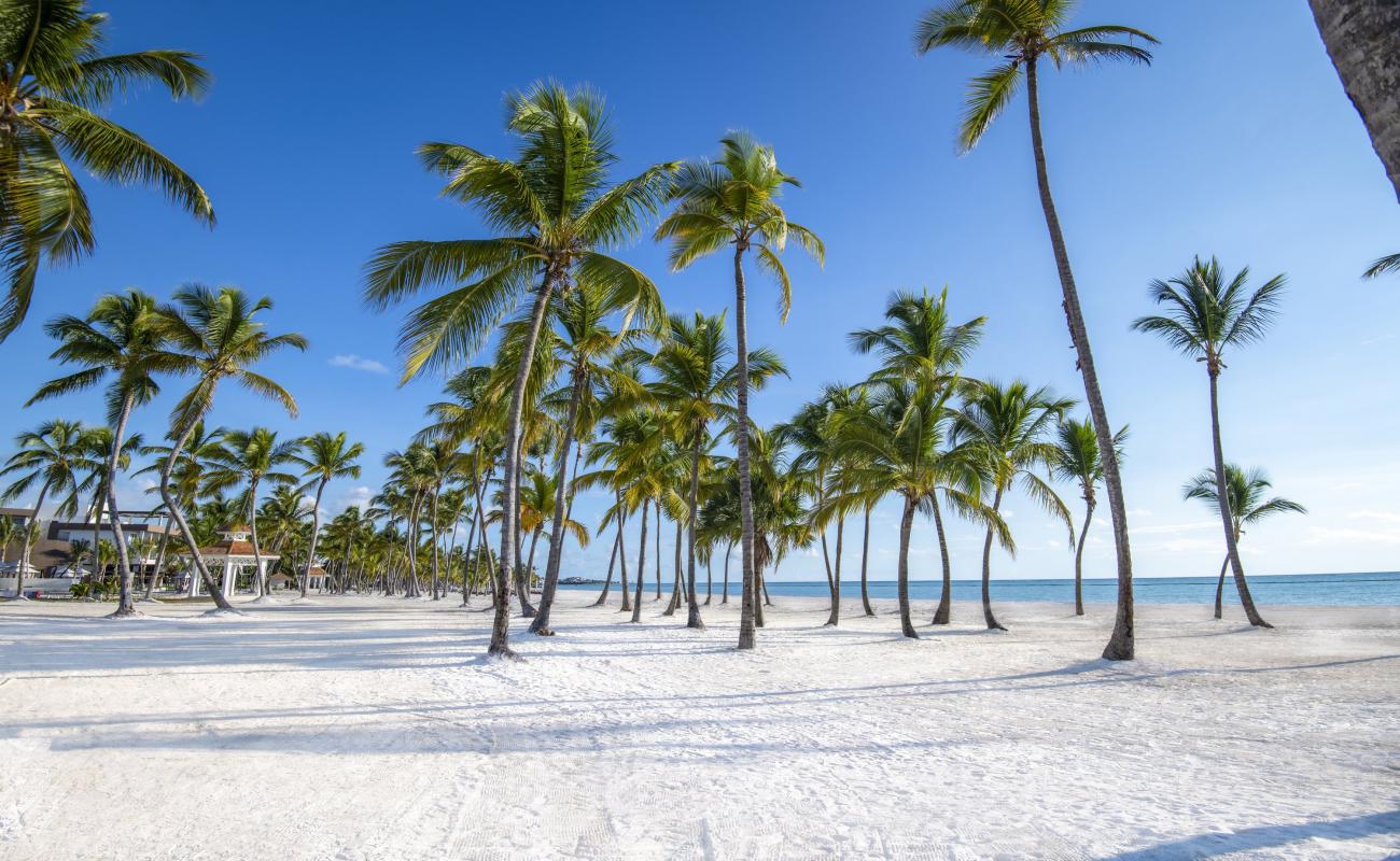 Photo of Juanillo beach with bright fine sand surface