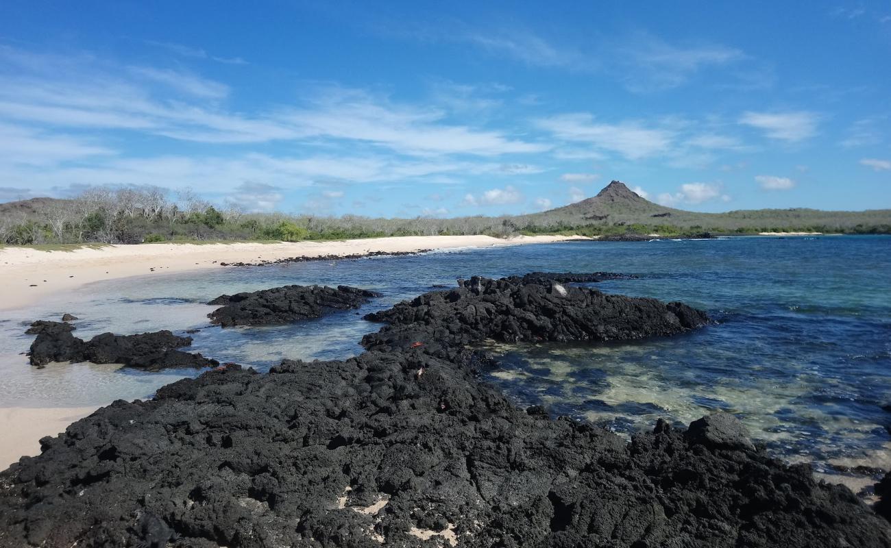 Photo of Cerro Dragon Beach with bright sand & rocks surface