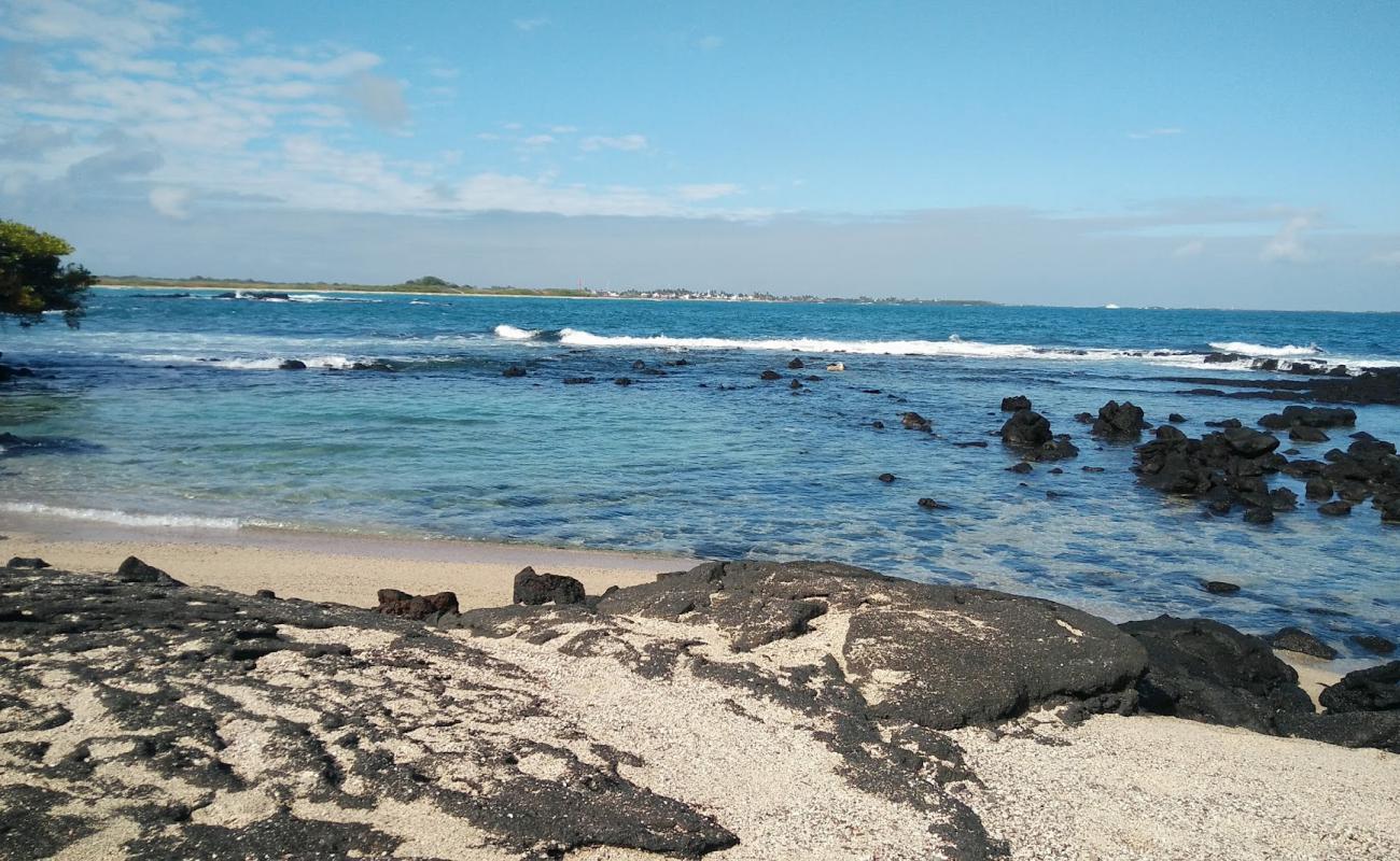 Photo of Playa del Amor with bright sand & rocks surface