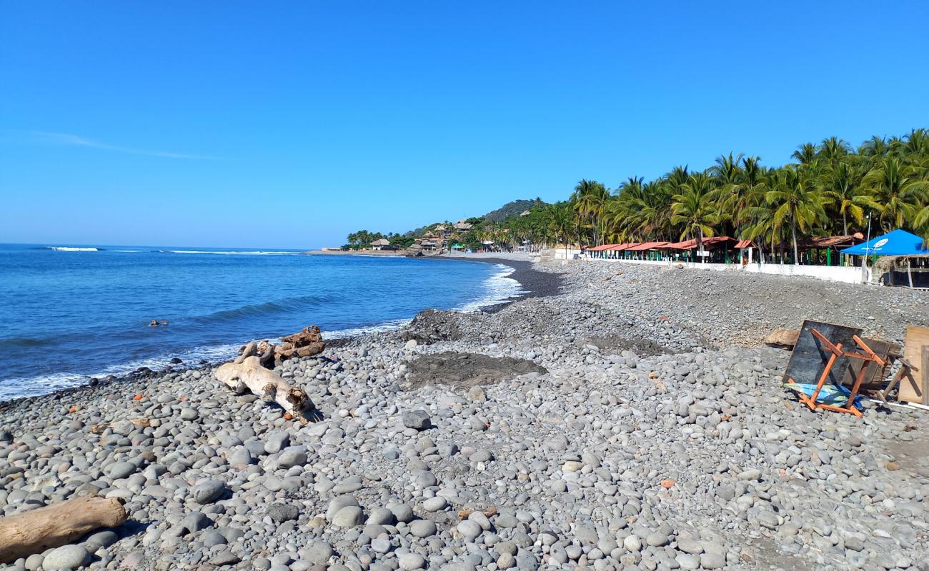 Photo of El Tunco beach with gray sand &  pebble surface