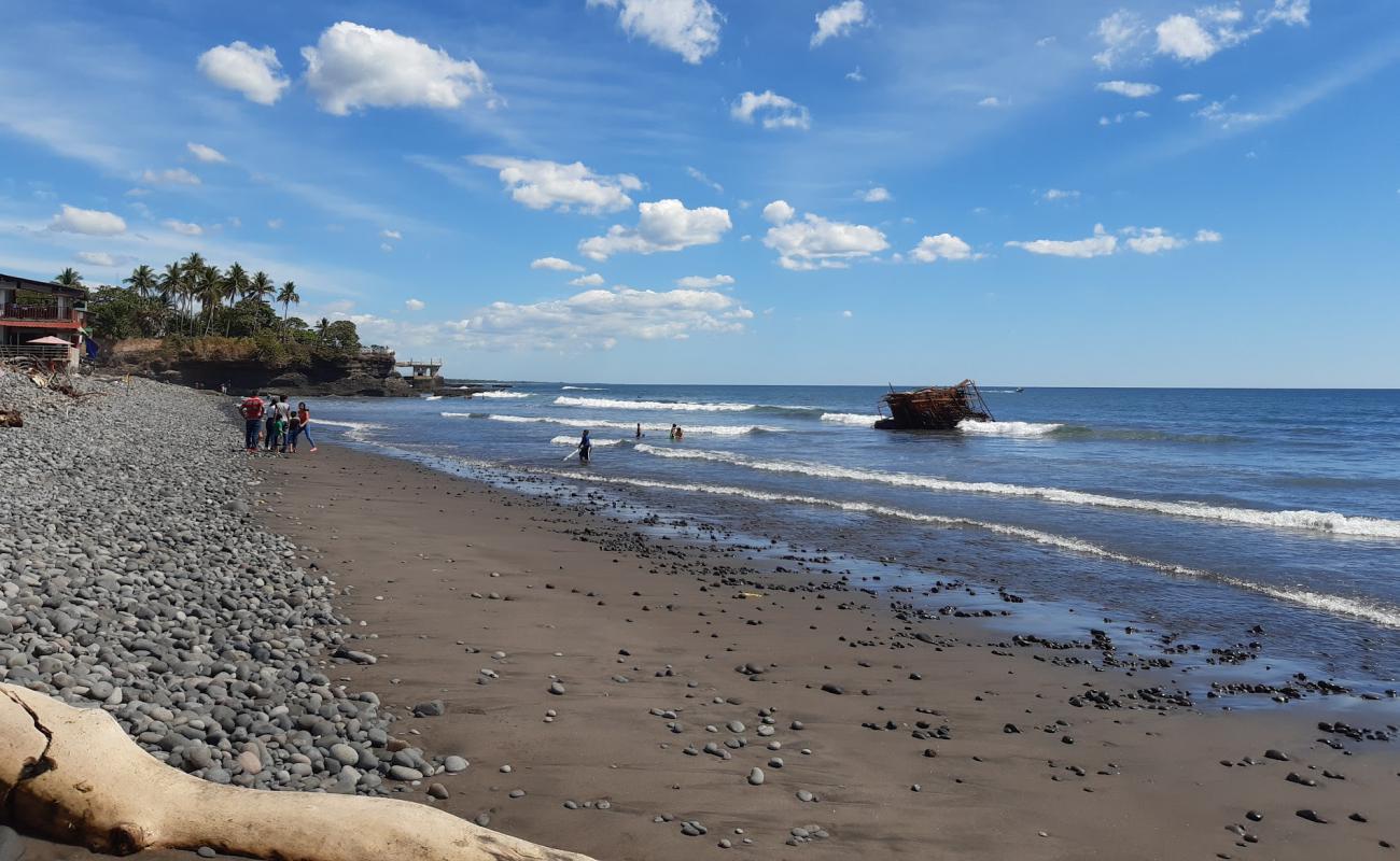 Photo of La Libertad beach with gray sand &  pebble surface