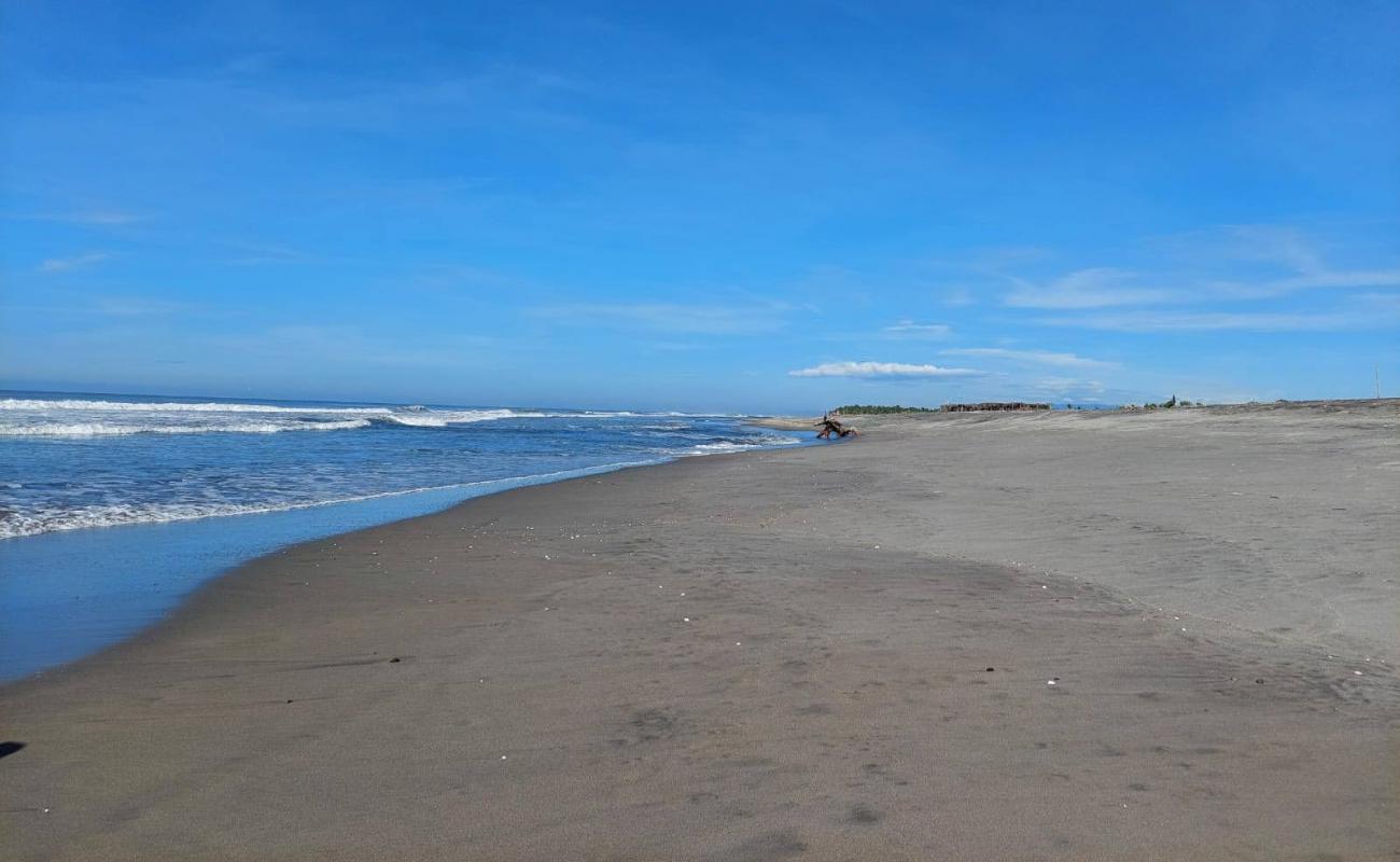 Photo of San Marcelino beach with gray sand surface