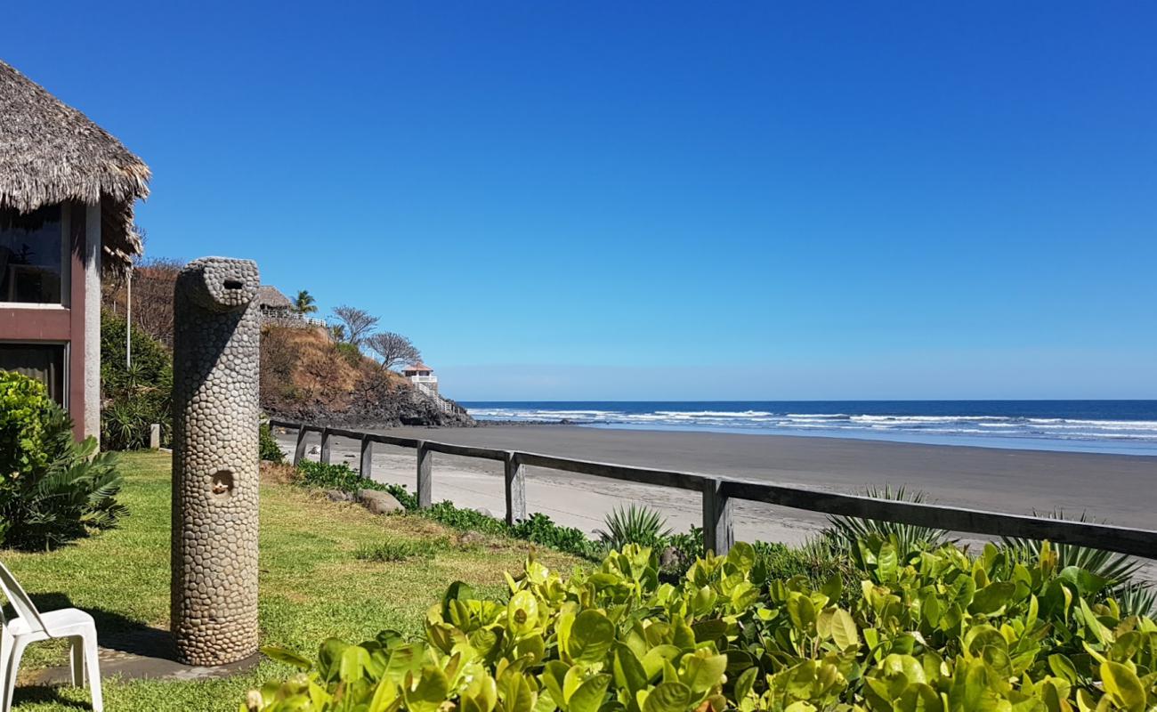 Photo of El Carrizal beach with gray sand surface