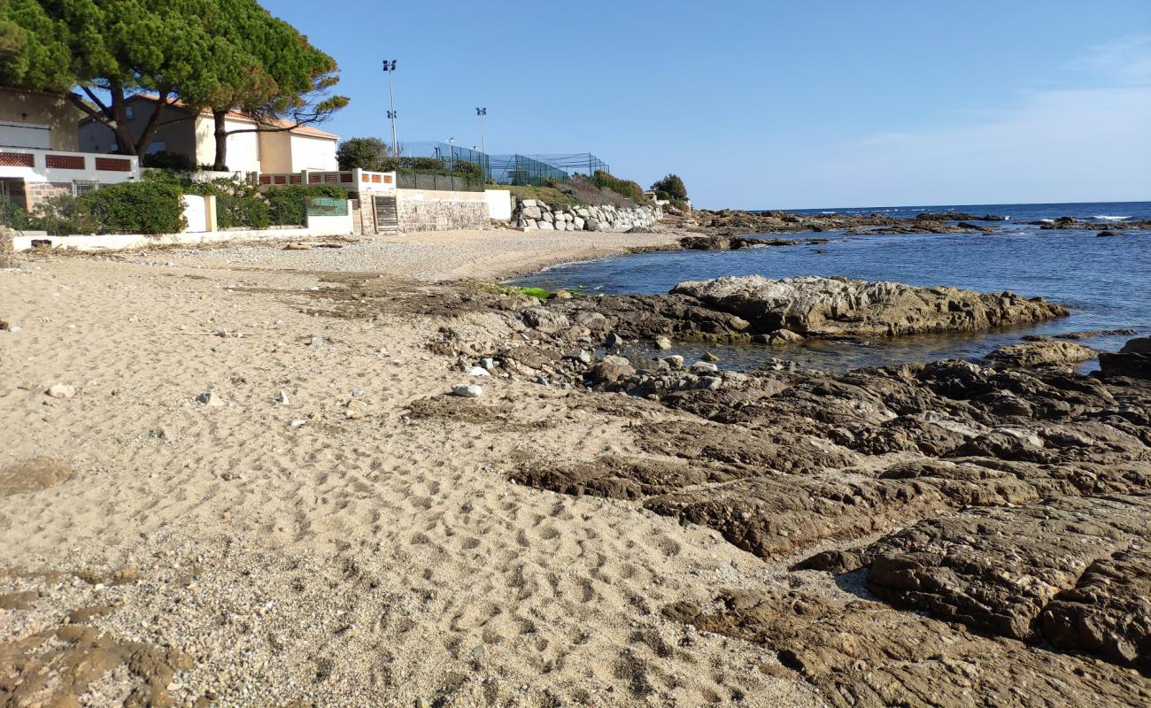 Photo of Plage de la Pinede with bright sand & rocks surface