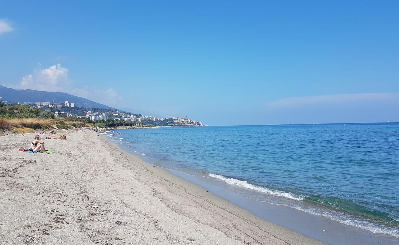 Photo of Plage de l'Arinella with bright sand surface