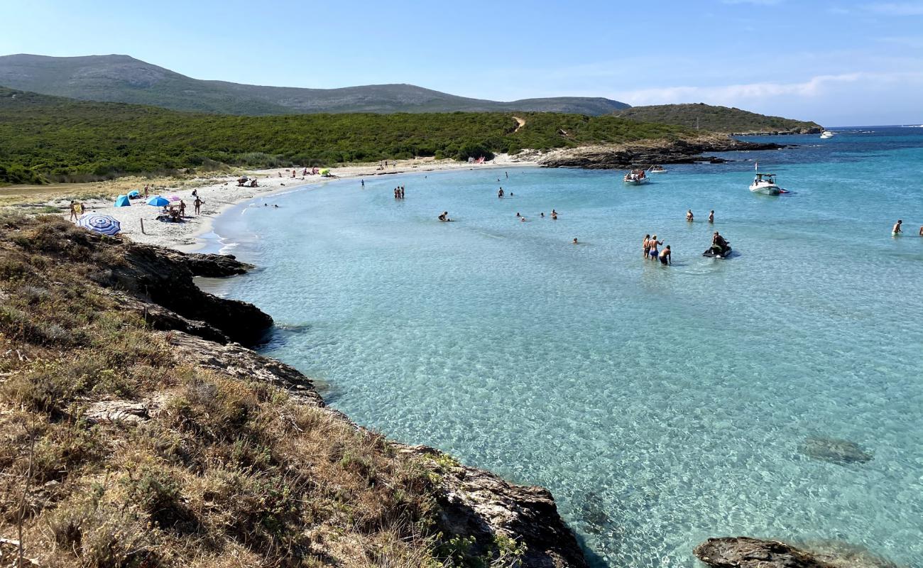 Photo of Cala Genovese beach with bright fine sand surface