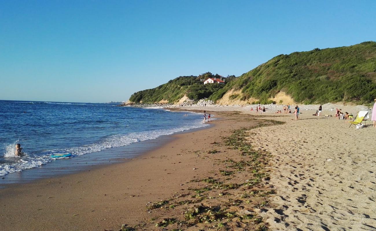 Photo of Plage de Senix with light sand &  pebble surface