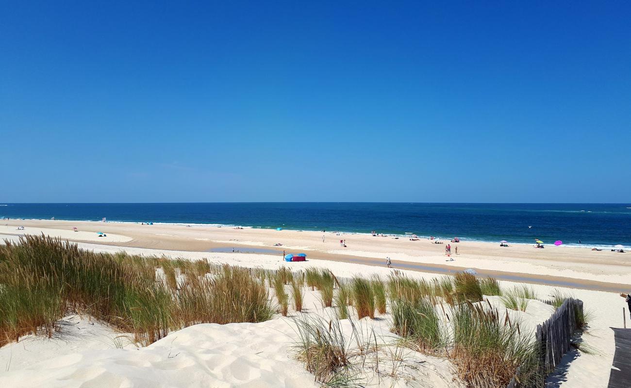 Photo of Plage de La Lagune with white fine sand surface