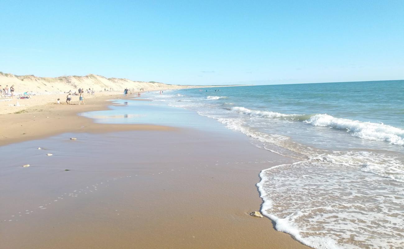 Photo of Rocher beach with bright sand surface