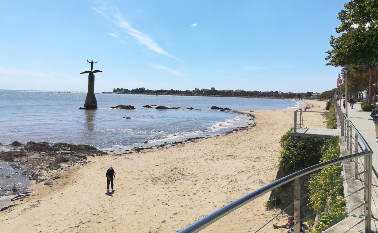 Photo of Petit Traict beach with bright sand & rocks surface