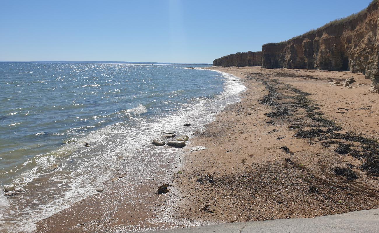 Photo of Sword Beach with light sand &  pebble surface