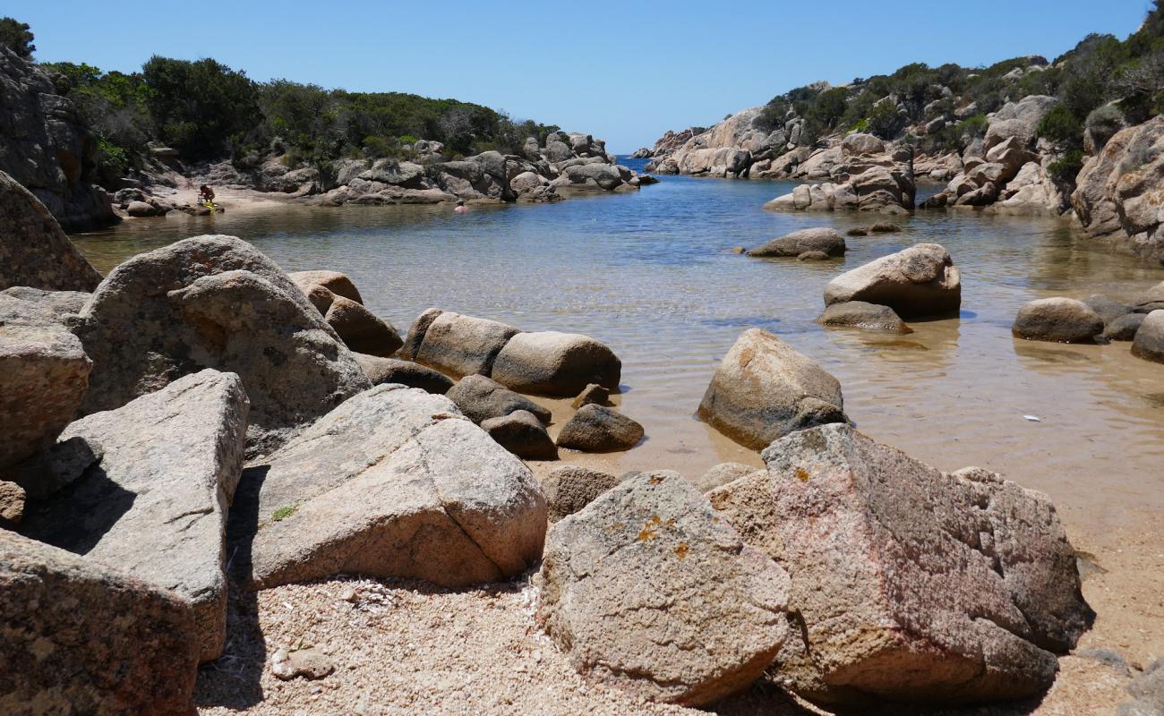 Photo of Cala Genovese with bright sand surface