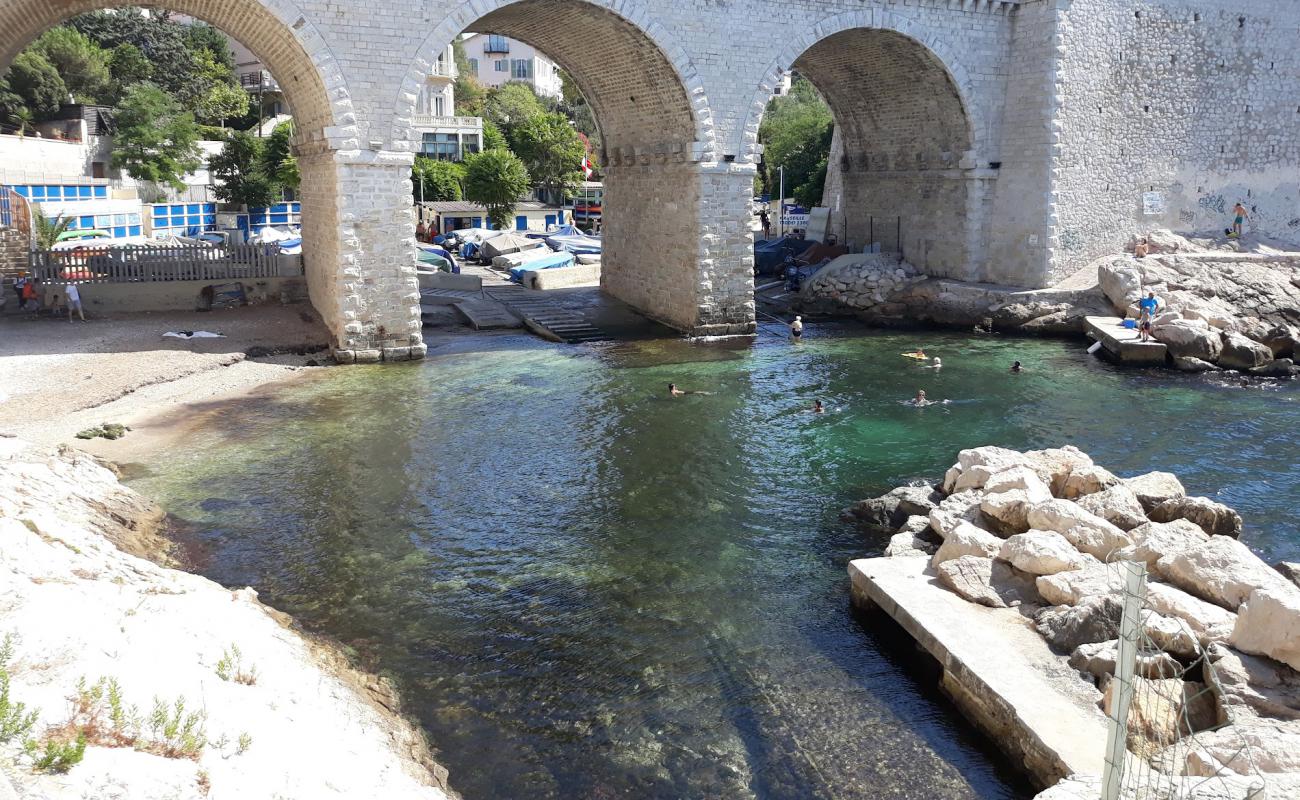 Photo of Pont de la Fausse Monnaie with bright sand & rocks surface