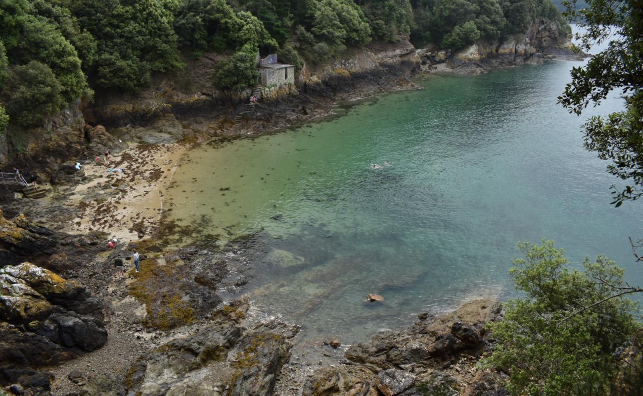 Photo of Plage des Corbieres with bright sand & rocks surface