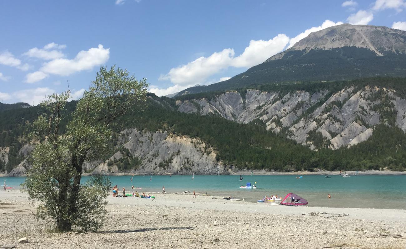 Photo of Plage de Chanterenne with rocks cover surface