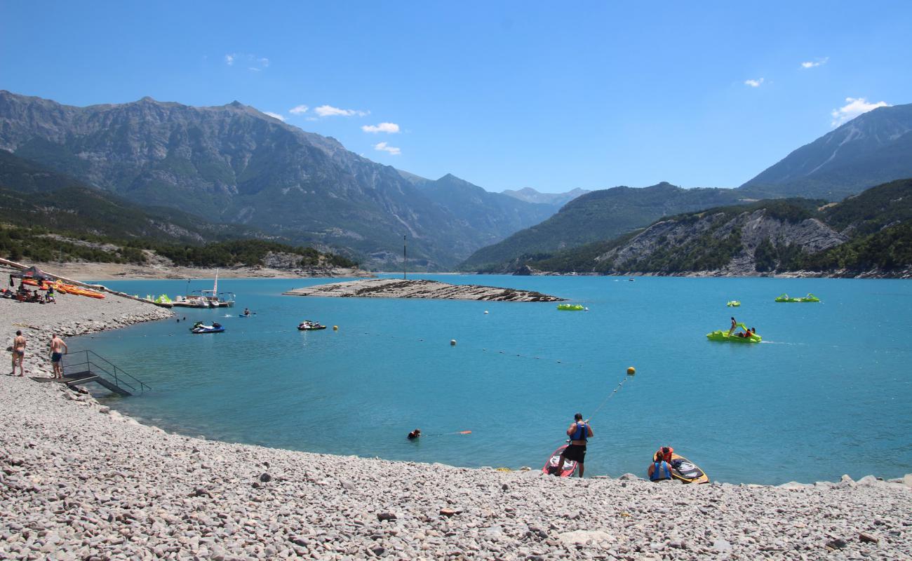 Photo of Plage de Port Saint Pierre with gray sand &  rocks surface