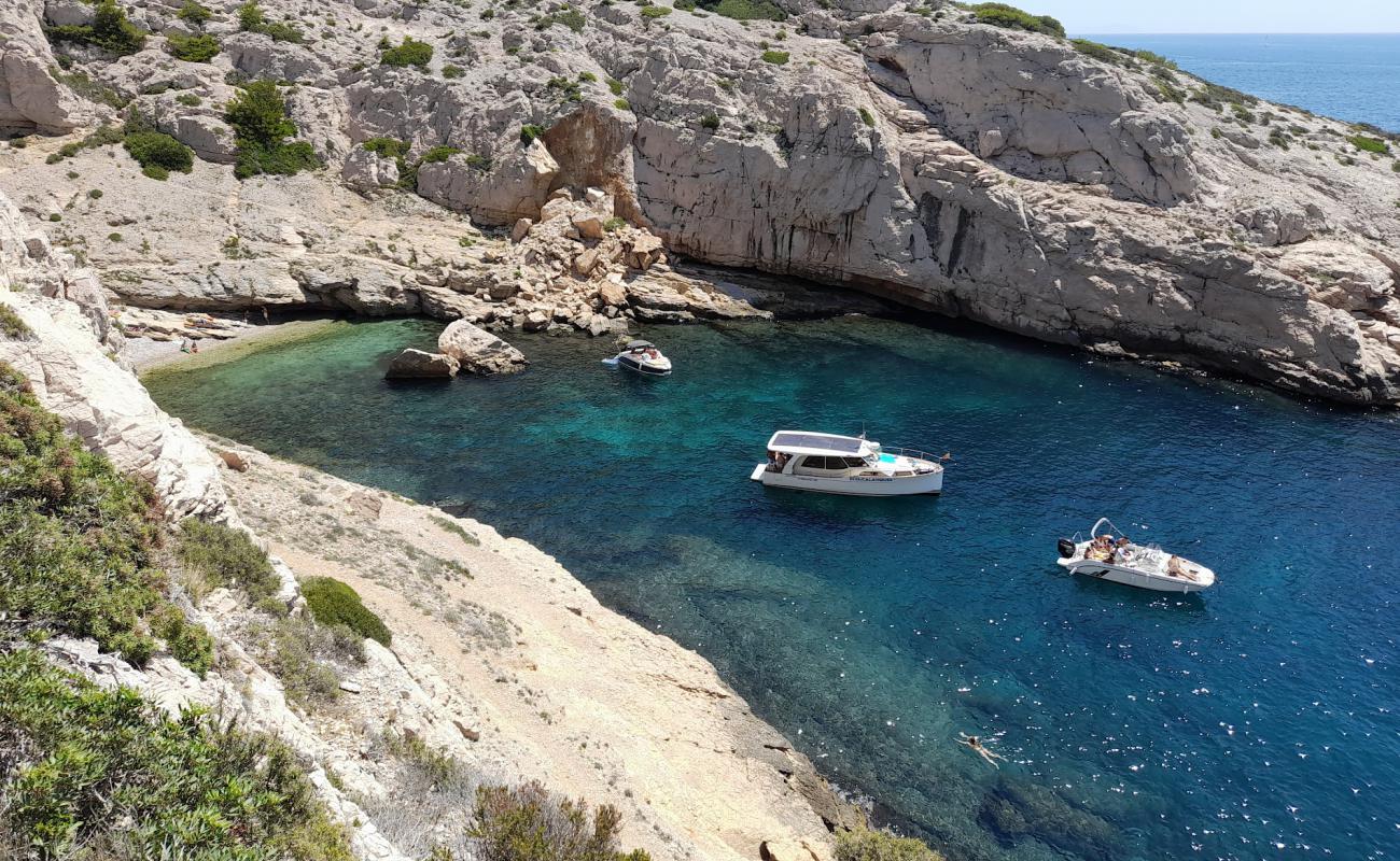 Photo of Calanque de Podestat with rocks cover surface